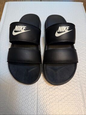 Nike Black Slides with White Swoosh Double Straps
